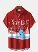 Camisa con botones navideños de Papá Noel con dibujos retro de Alohadaddy