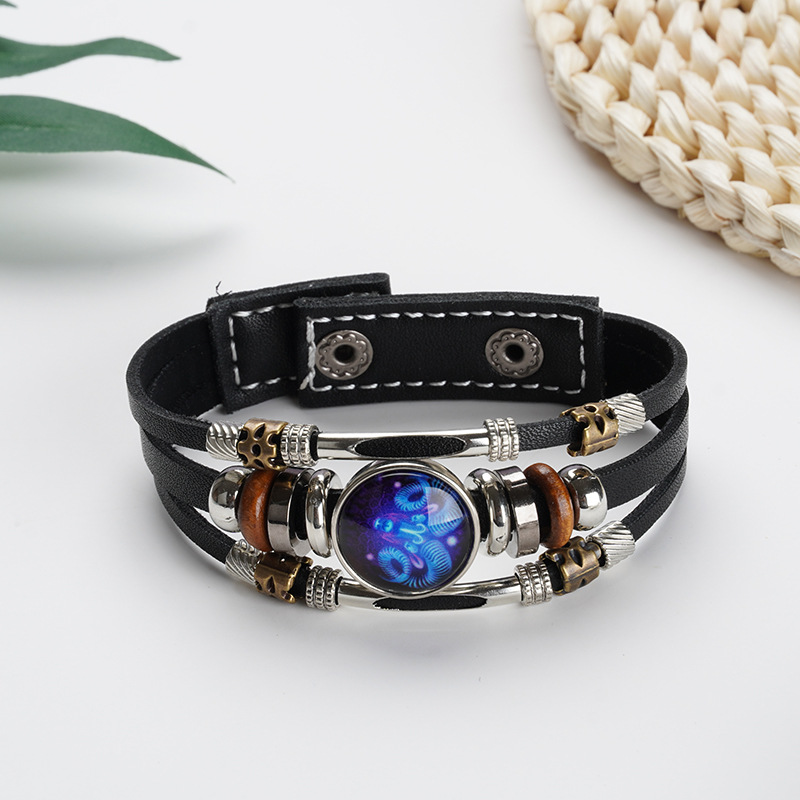Pulsera de cuero trenzada con hebilla de cuentas de tres capas luminosa con doce constelaciones