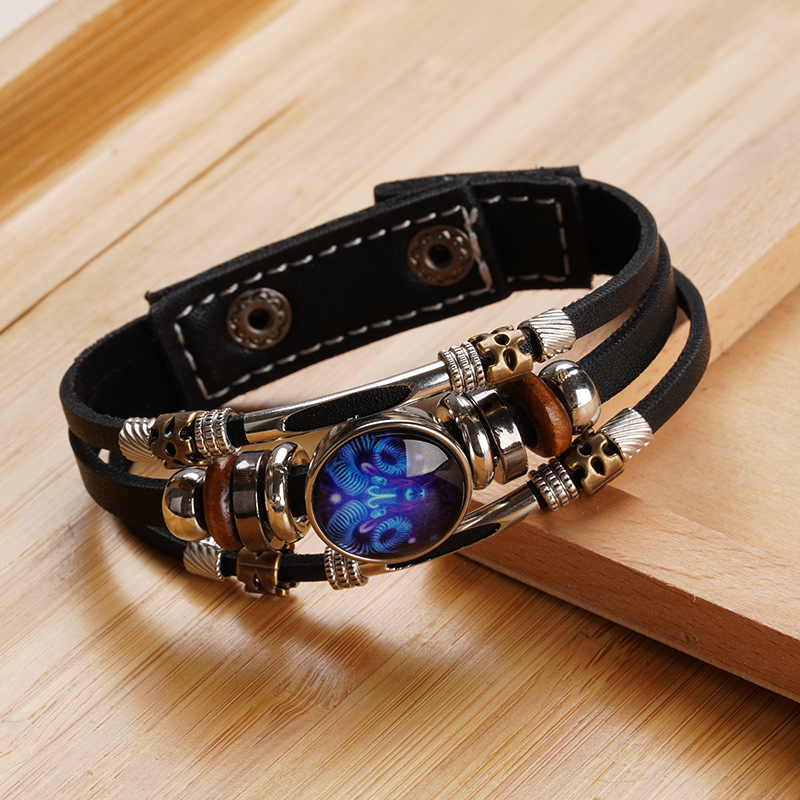 Pulsera de cuero trenzada con hebilla de cuentas de tres capas luminosa con doce constelaciones