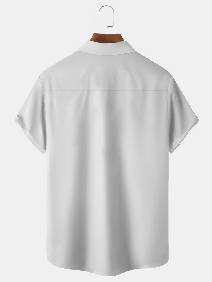 Chemise à manches courtes et poches boutonnées pour homme avec imprimé perroquet hawaïen Alohadaddy