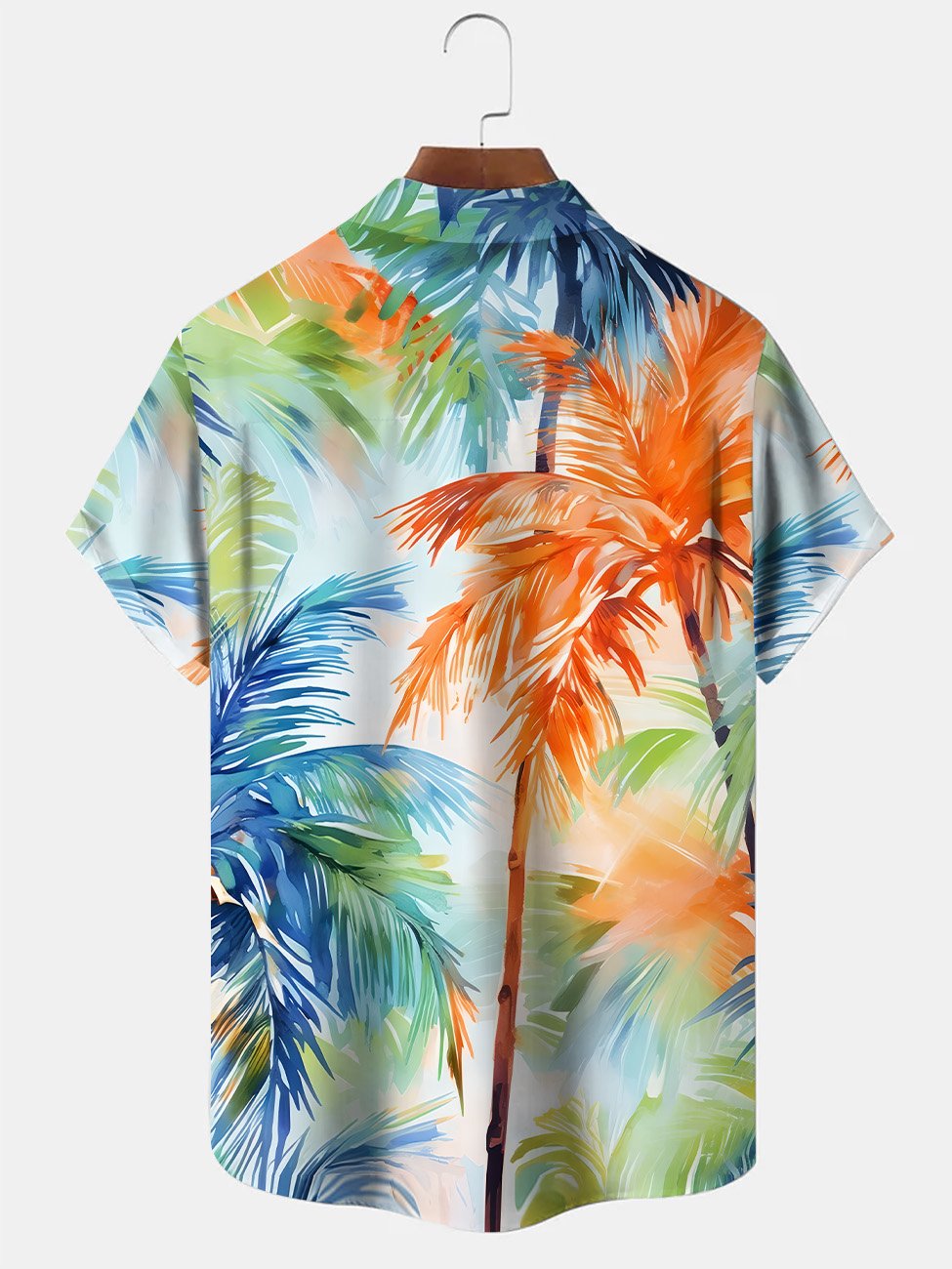 Chemise décontractée à manches courtes avec poche boutonnée et motif cocotier sur la plage d&