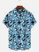 Camisa informal de manga corta con bolsillo abotonado y diseño de pingüino y muñeco de nieve navideño de Alohadaddy