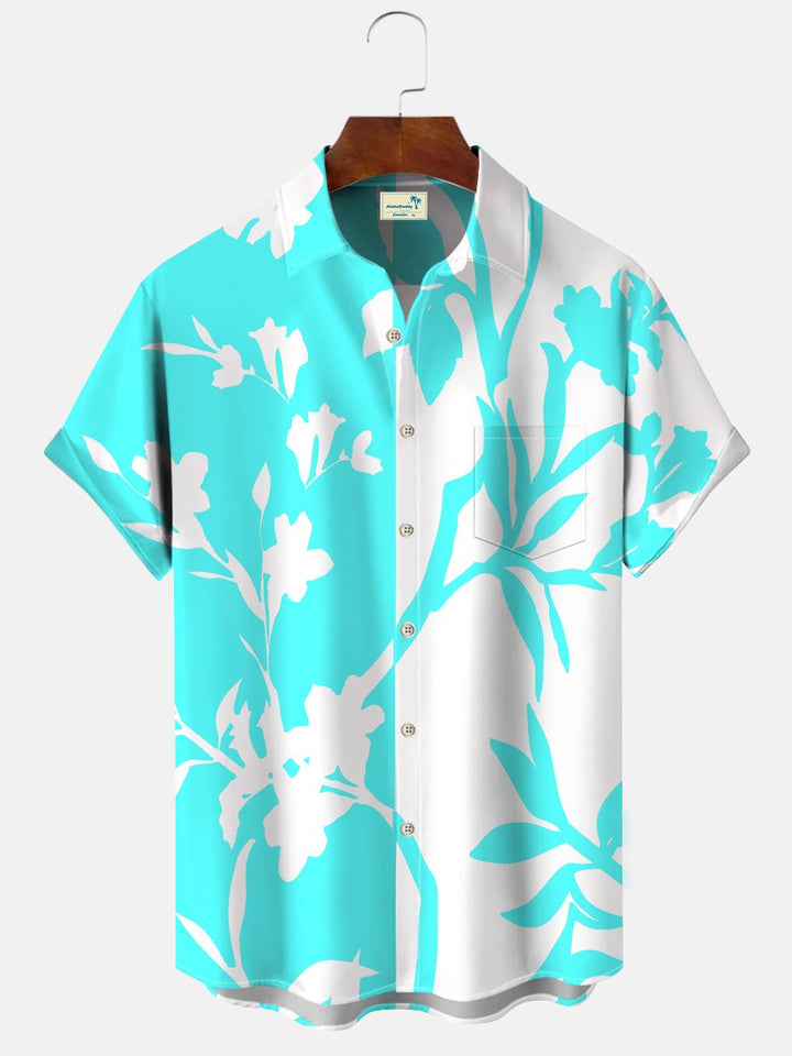 Camisa informal de manga corta con bolsillos y botones, flores, hojas y plantas en contraste de colores Alohadaddy