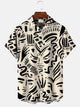 Camisa casual de manga corta con bolsillos y botones con rostro humano y líneas geométricas de Alohadaddy