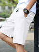 Pantalones cortos casuales con cordón y cintura elástica de color sólido para hombre