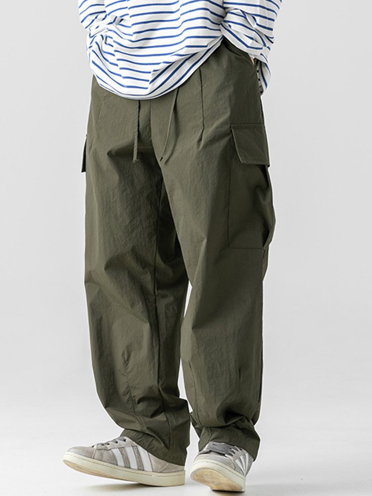 Pantalones de trabajo informales con bolsillos tridimensionales, sueltos y con diseño plisado para exteriores para hombre