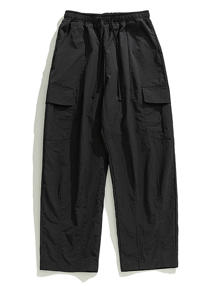 Pantalones de trabajo informales con bolsillos tridimensionales, sueltos y con diseño plisado para exteriores para hombre