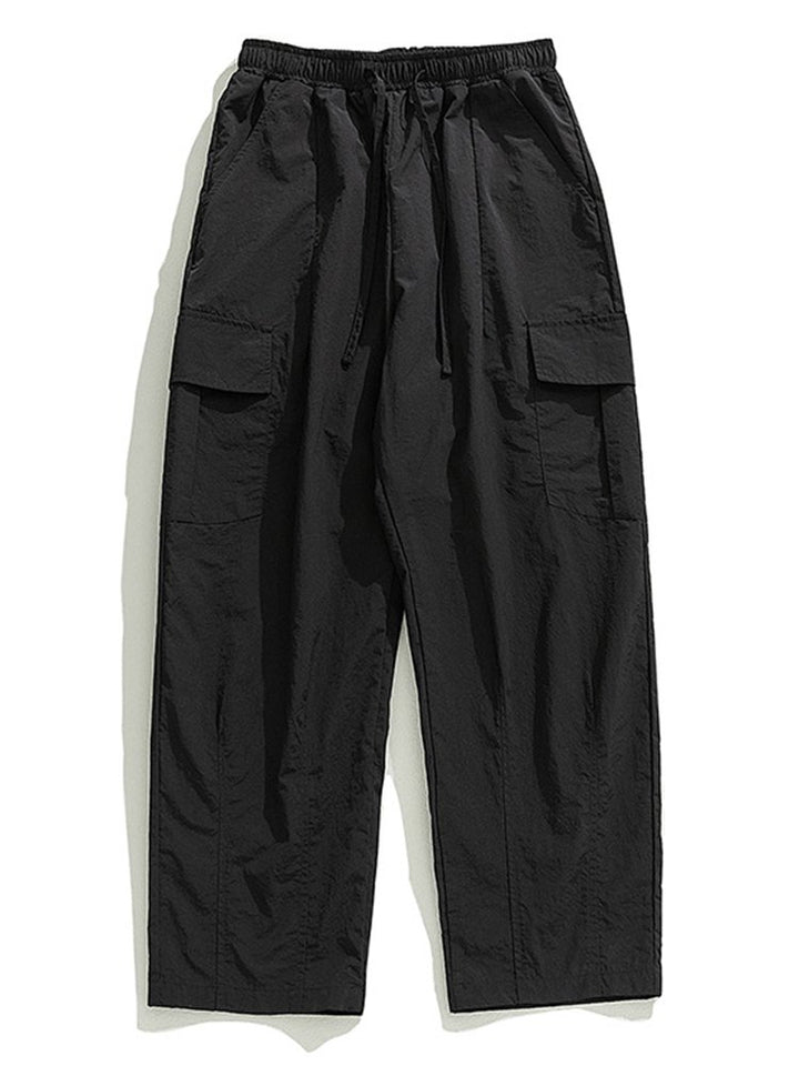 Pantalones de trabajo informales con bolsillos tridimensionales, sueltos y con diseño plisado para exteriores para hombre