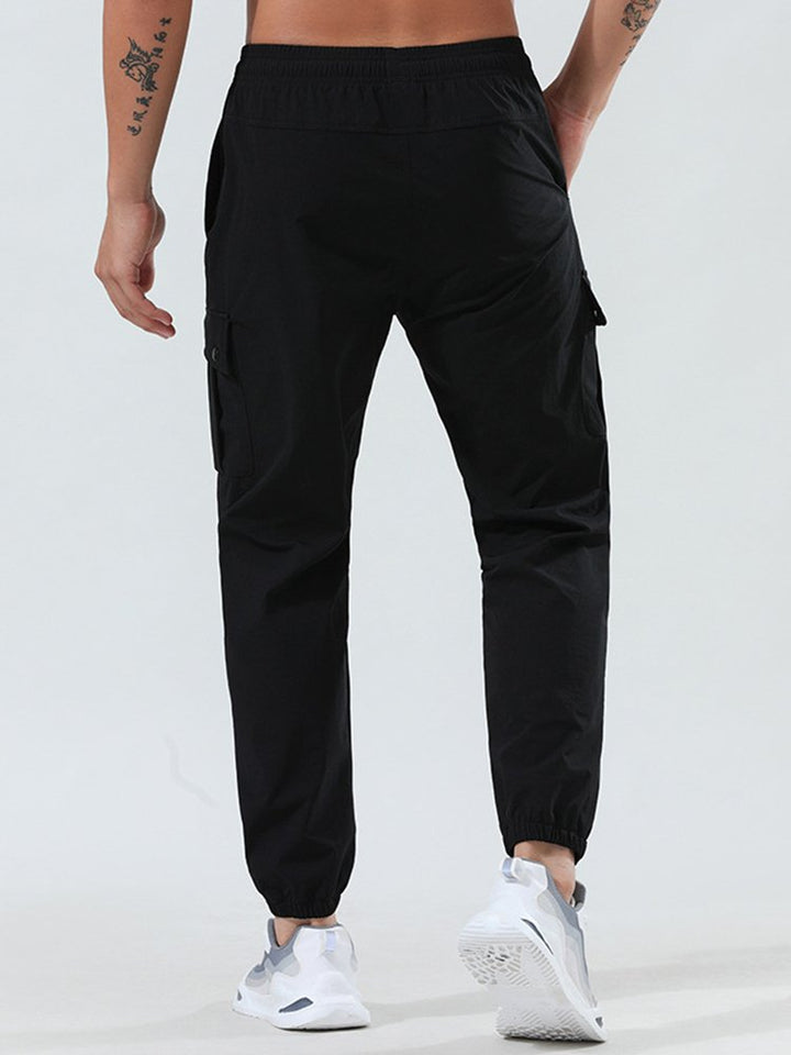 Pantalones de secado rápido para exteriores para hombre, pantalones holgados de tejido elástico con pies de viga, pantalones casuales de fitness