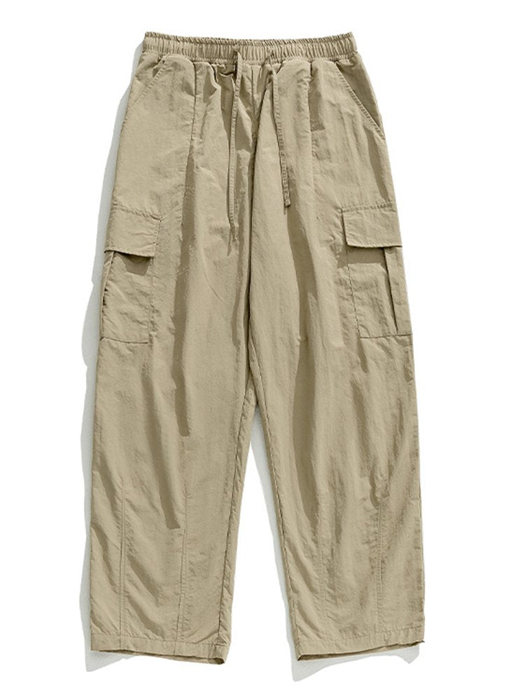 Pantalones de trabajo informales con bolsillos tridimensionales, sueltos y con diseño plisado para exteriores para hombre