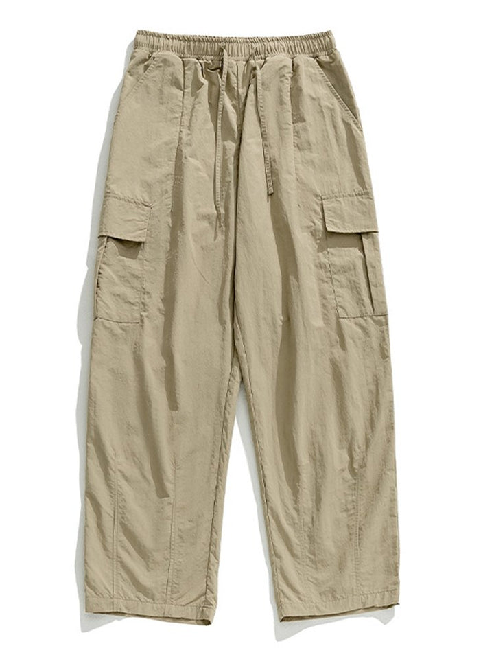 Pantalones de trabajo informales con bolsillos tridimensionales, sueltos y con diseño plisado para exteriores para hombre