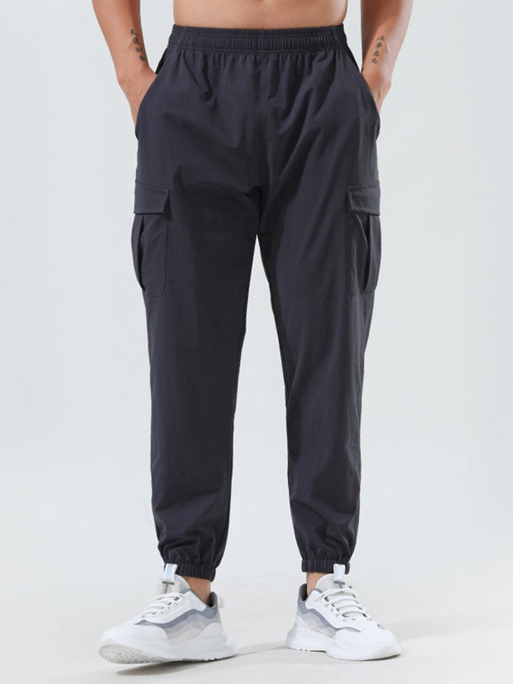 Pantalones de secado rápido para exteriores para hombre, pantalones holgados de tejido elástico con pies de viga, pantalones casuales de fitness